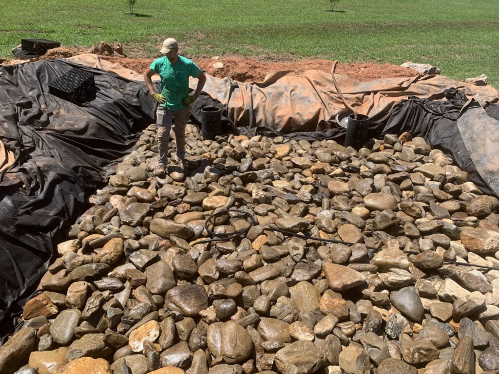 First layer of cobble stones in wetland filter for rec pond