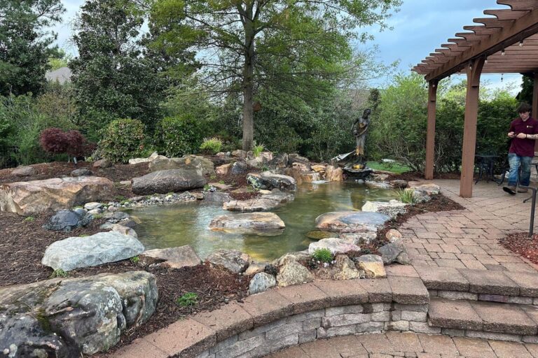 Stepping Stones across koi pond in Marvin, NC