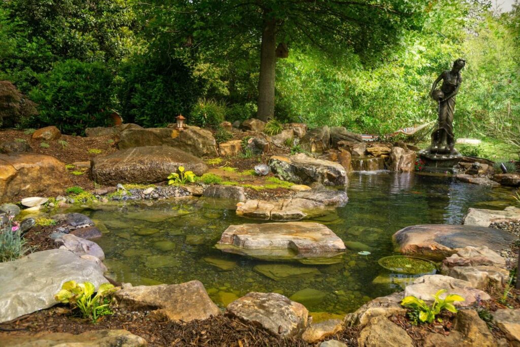 Stepping Stones across pond in Marvin, NC Backyard