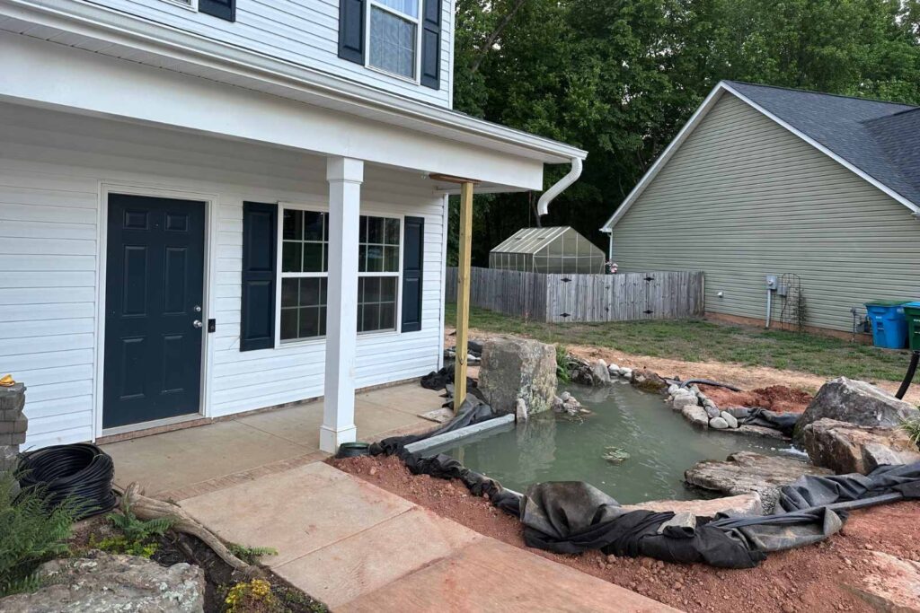 Pondscapes of Charlotte building a custom water garden pond during construction in Wesley Chapel, North Carolina