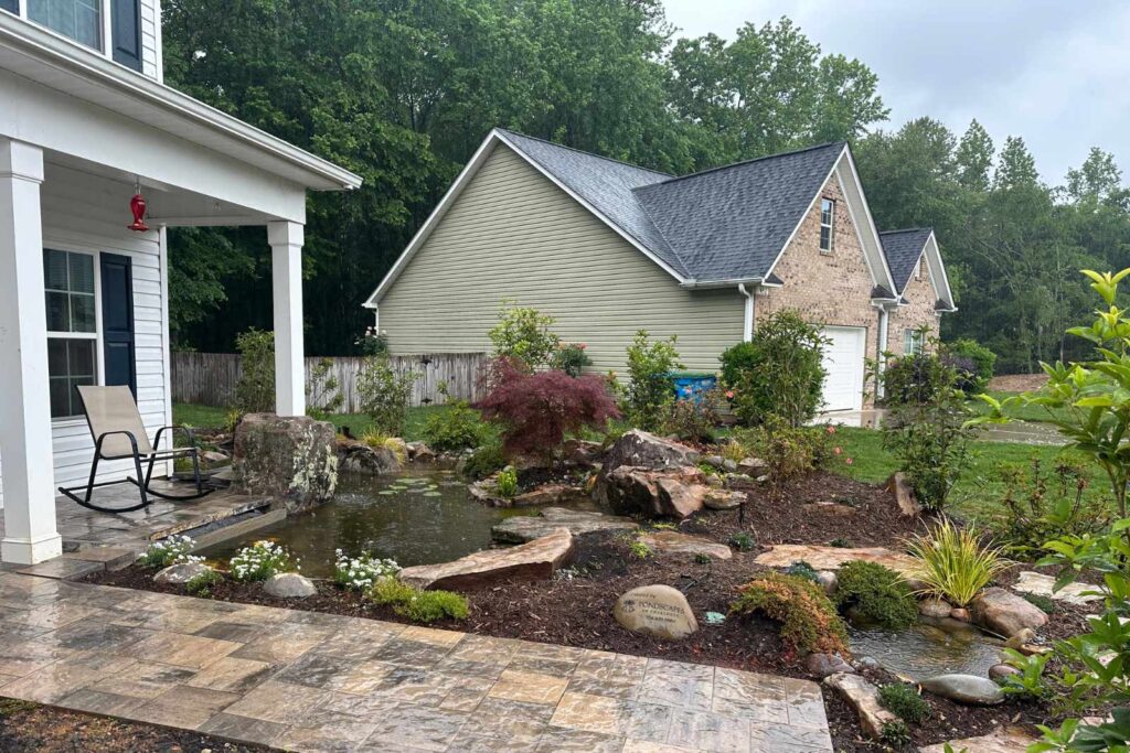 Front yard koi pond installed by Pondscapes of Charlotte, custom pond construction in Charlotte, North Carolina