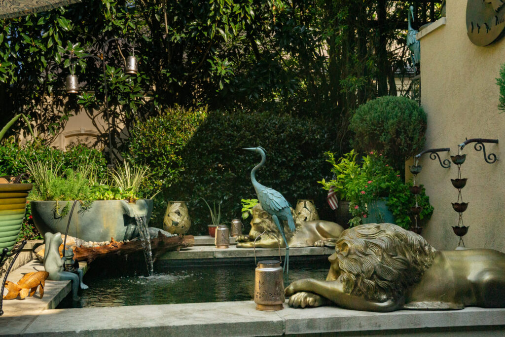 tone spillway bowl water feature added to backyard koi pond installation South Park Charlotte