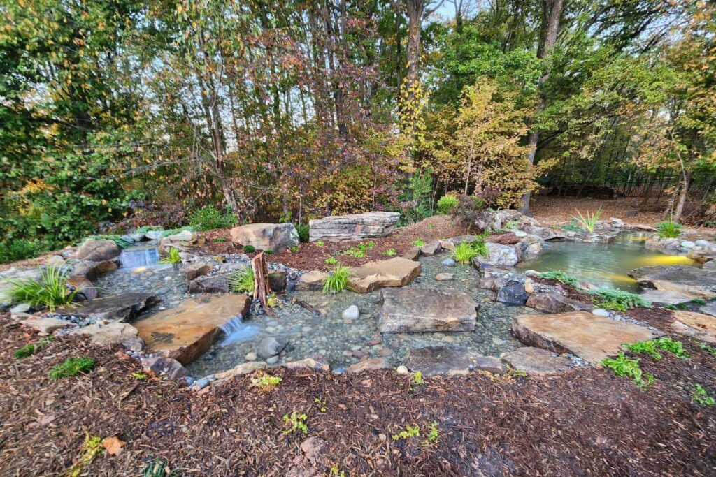 Beautiful stream built by expert pond contractor Pondscapes of Charlotte