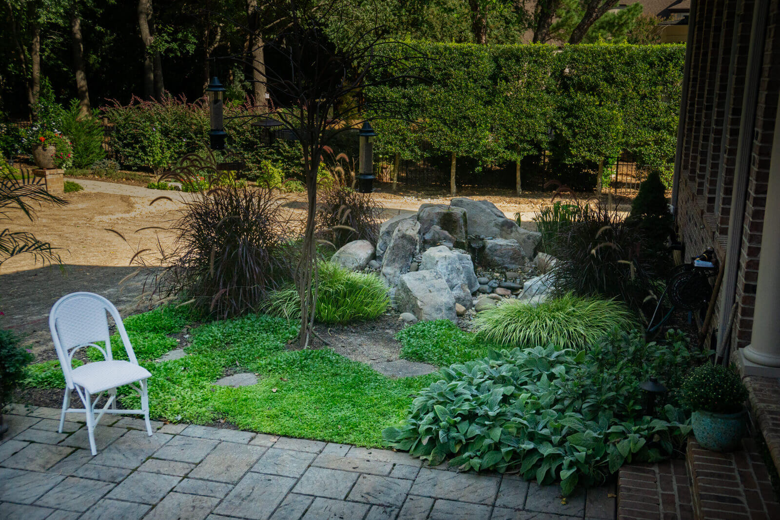 Before photo of backyard area prior to waterfall installation in Charlotte NC