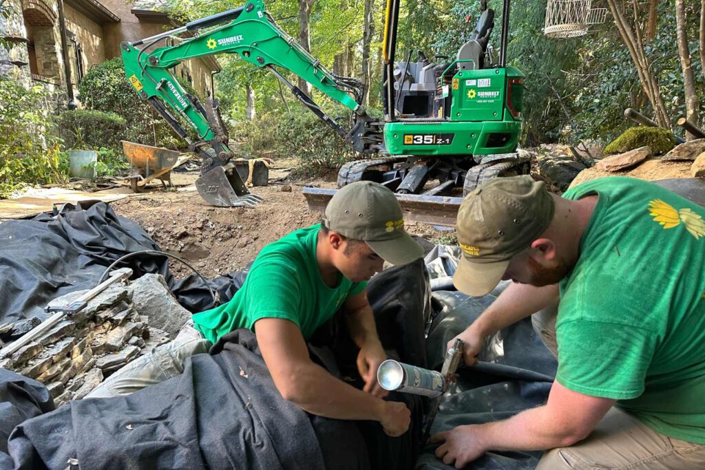 Foaming behind a rock for this waterfall going into a pond in South Park