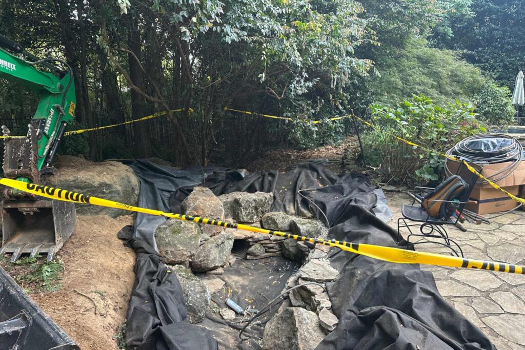 End of day on backyard pond build in South Park