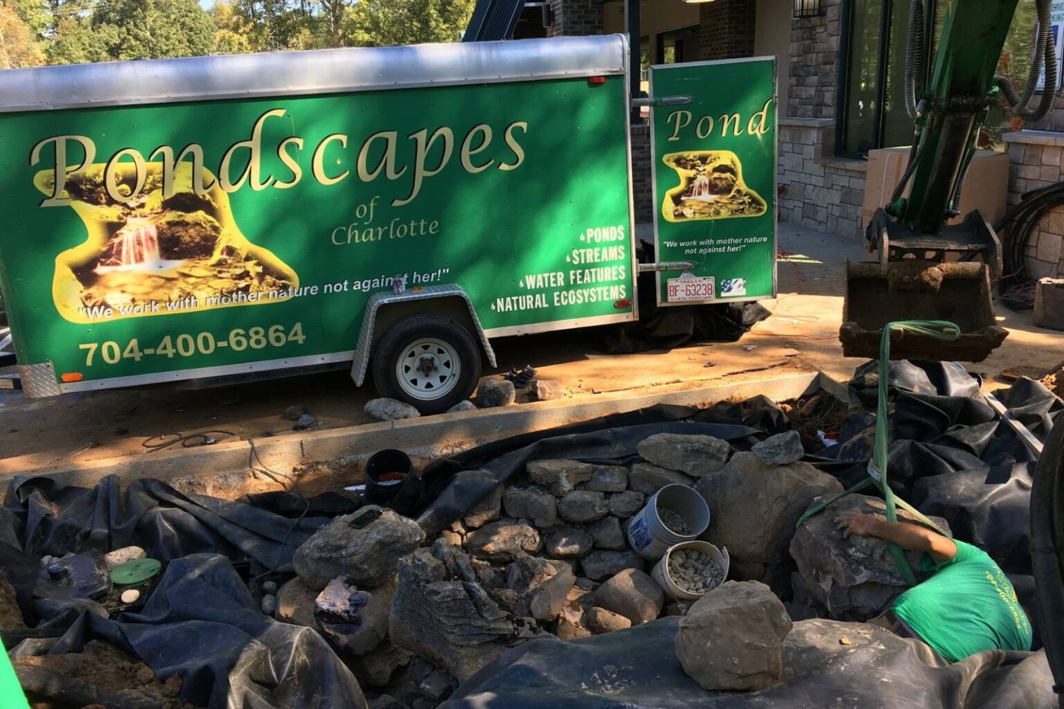 Pondscapes of Charlotte trailer and crew building commercial pond at Pike Nurseries Matthews, NC