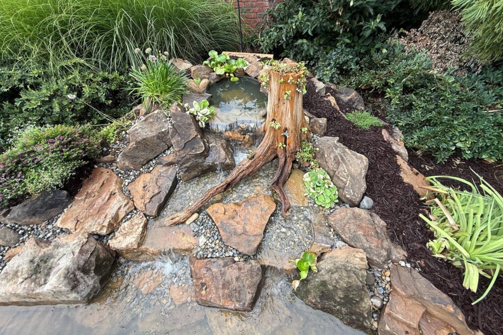 stump built into waterfall