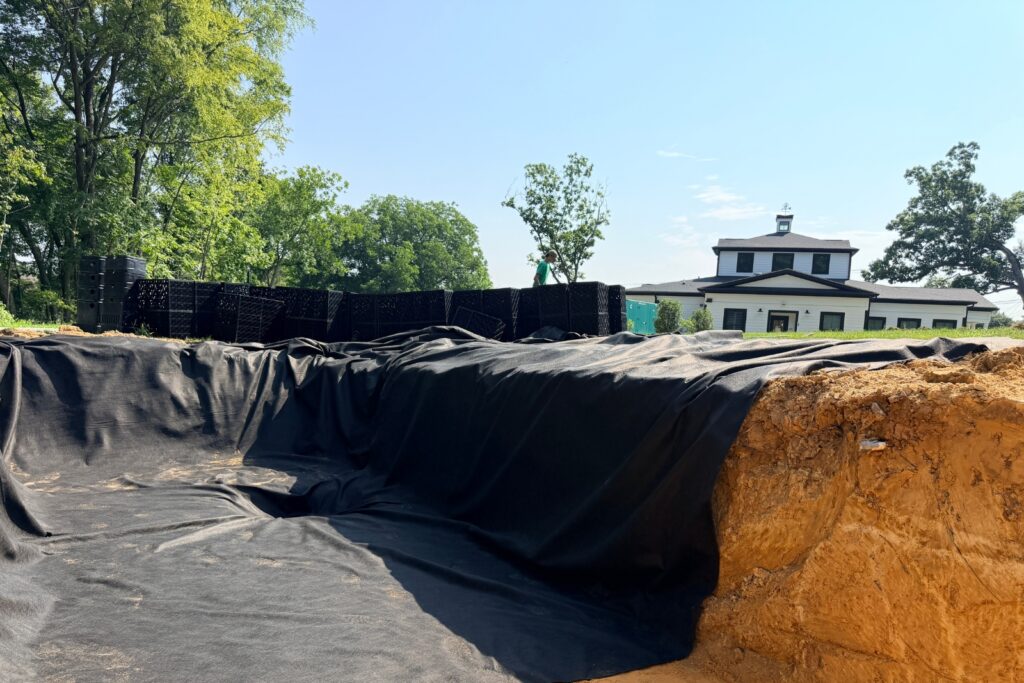 Water feature under linement for new educational pond at Houston Ross Park.