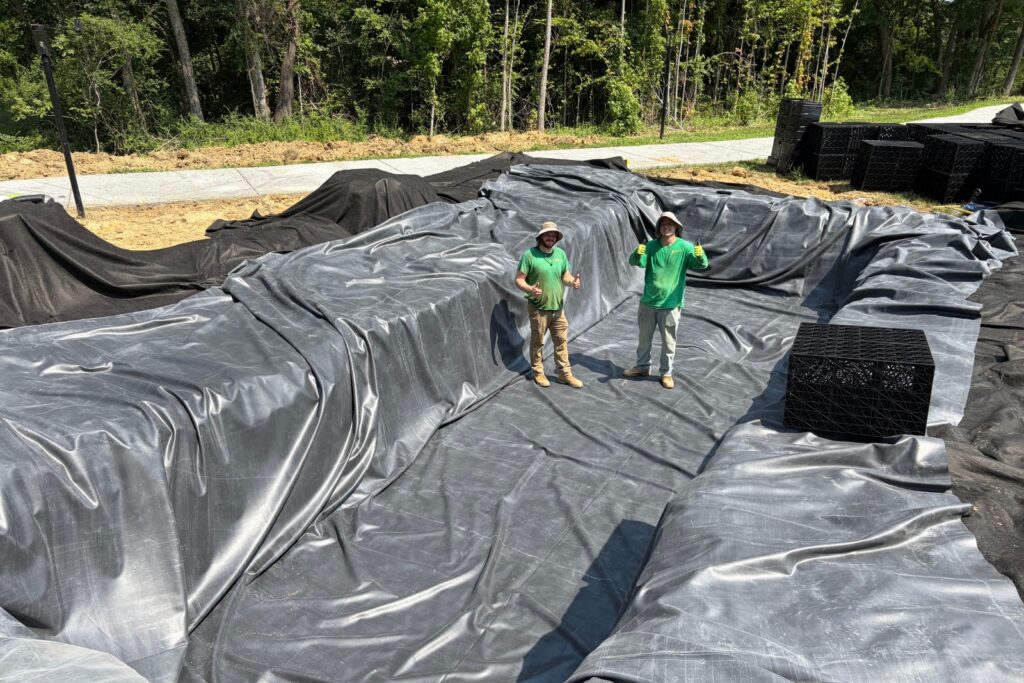 Liner in place for new rainwater harvesting system project to start.