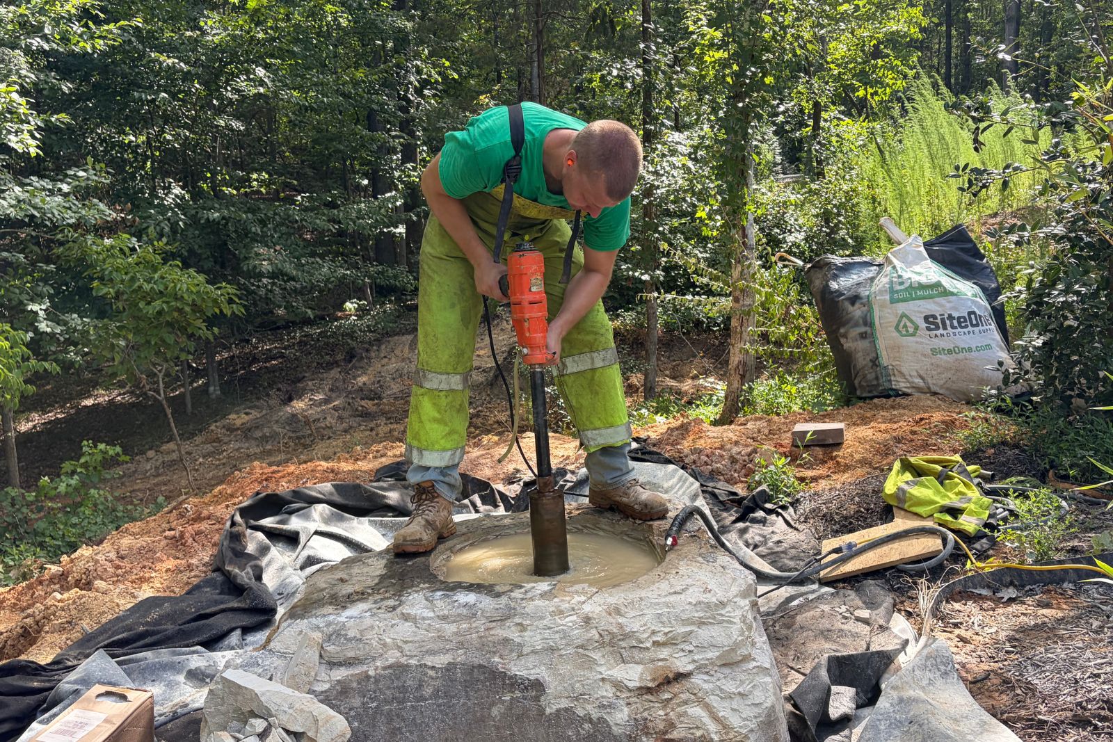 Core Drilling Through Boulder to create a custom fountain in Mint Hilll , North Carolina
