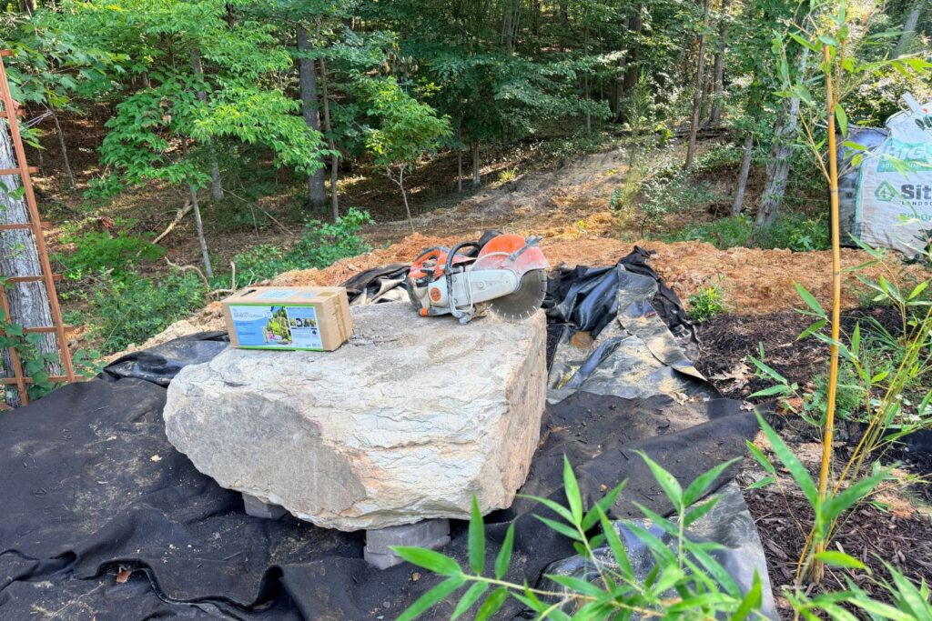 Large boulder before being custom cut for the fountain
